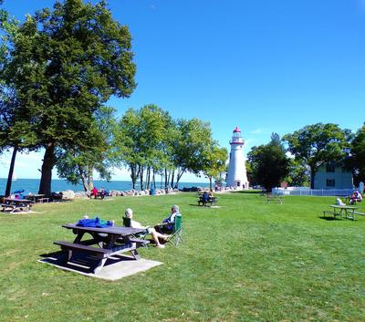 Park lawn with the lighthouse in the distance