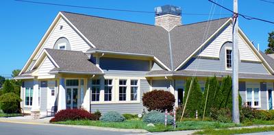 A building with a slanted roof.